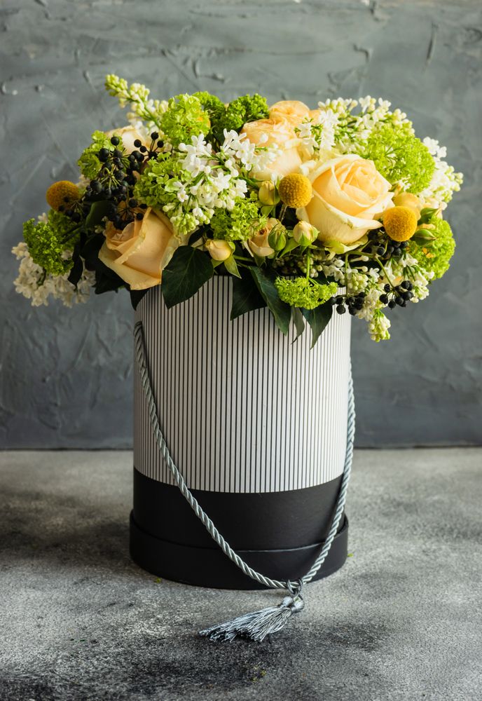 Side view of elegant yellow rose bouquet