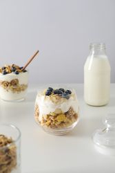 Tasty and nutritious breakfast concept - muesli with yogurt