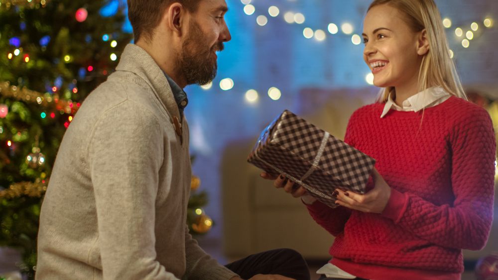 Man Gives Christmas Gift to His Girlfriend.