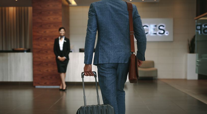Business traveler arriving at hotel