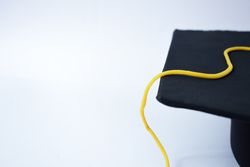 Graduation cap in studio shoot with copy space