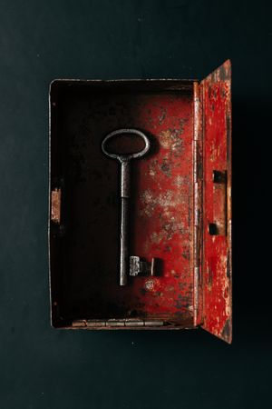 Open box with red interior and key