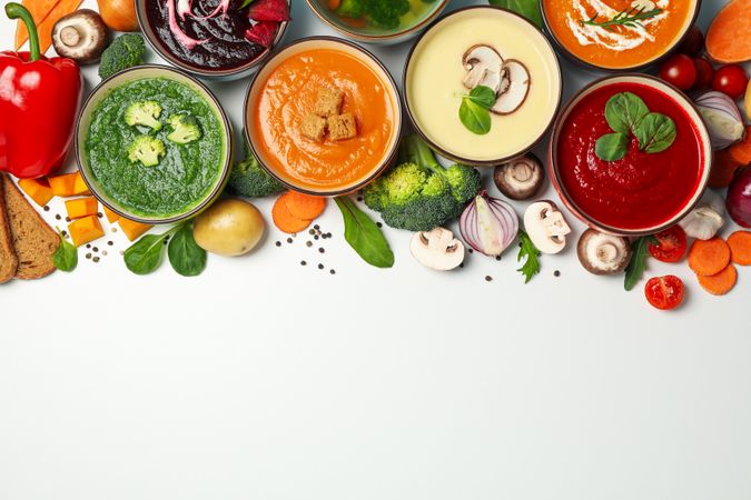 Colorful soups on top of picture with copy space