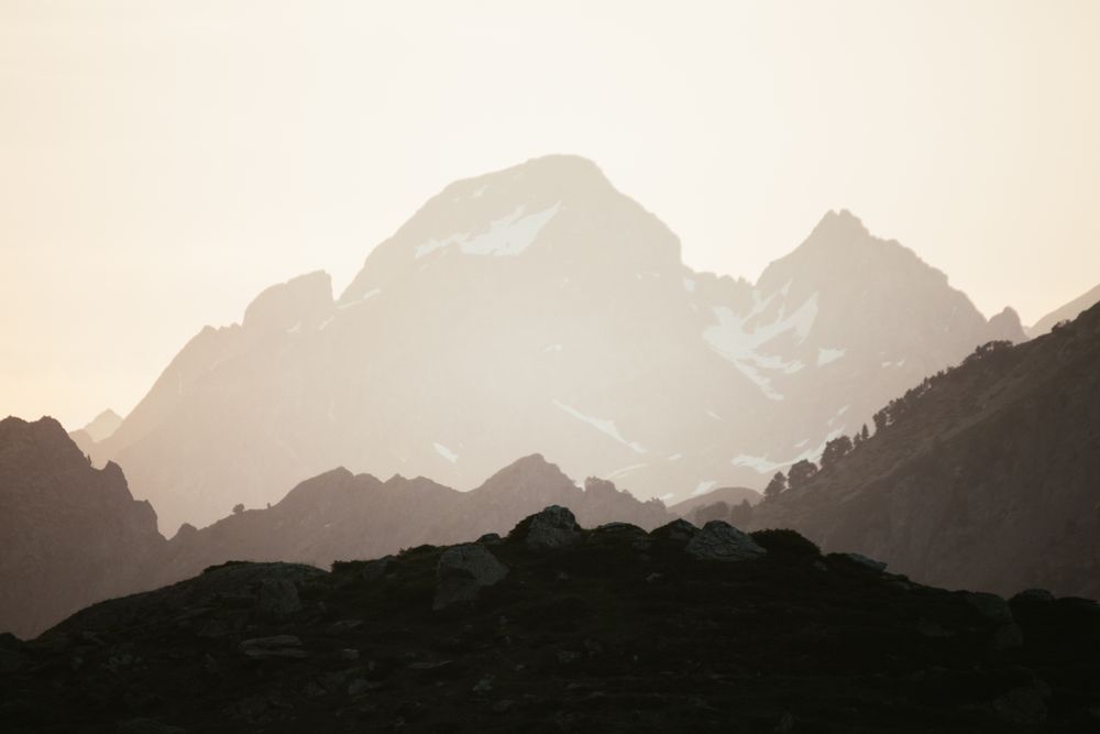 Majestic mountains range in clouds