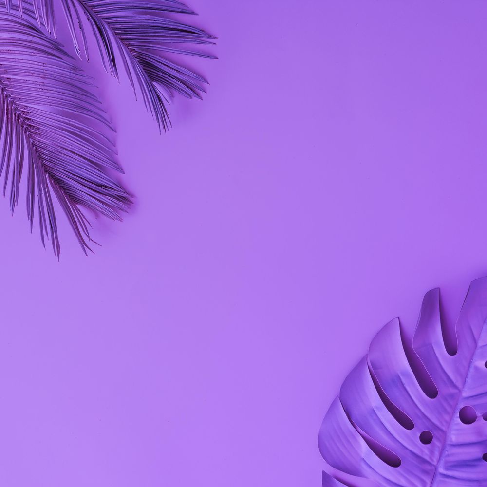 Tropical leaves in vibrant purple holographic color