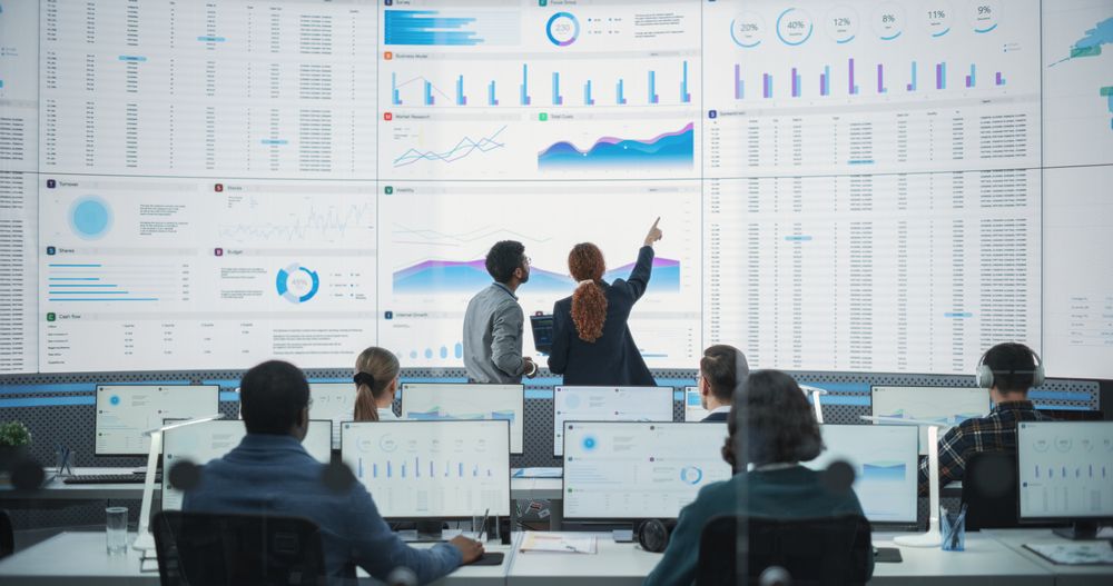 Male and Female Experts Talking, Employees Working On Computers In Consulting Company