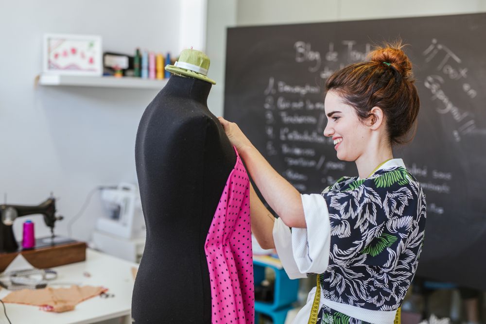 Woman in a sewing school