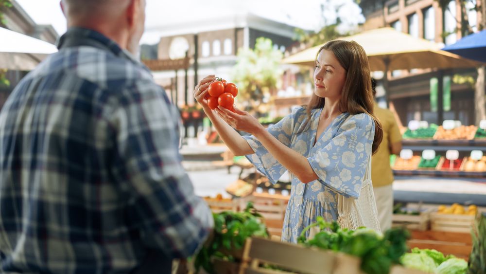 Portrait of a Young Customer Shopping for Organic Seasonal Fruits and Vegetables for a Healthy Breakfast.