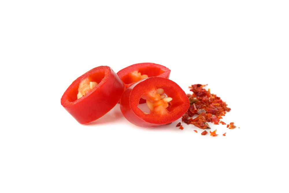 Chilli pepper slices isolated on blank background
