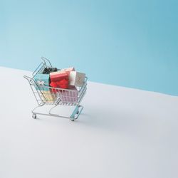 Shopping cart full with gift boxes
