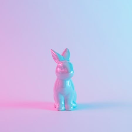 Plastic Easter bunny with colorful ultraviolet holographic neon lights