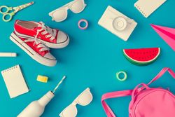 Back to school supplies on bright blue background