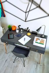 Youth bedroom interior with desk