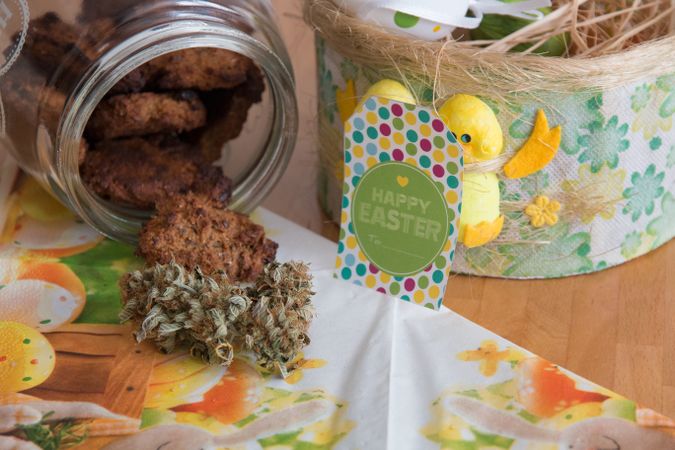 Dried marijuana with a cookie jar and Easter decorations