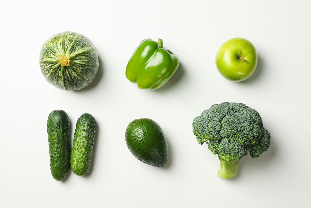 Fresh vegetables and fruits on blank background, top view