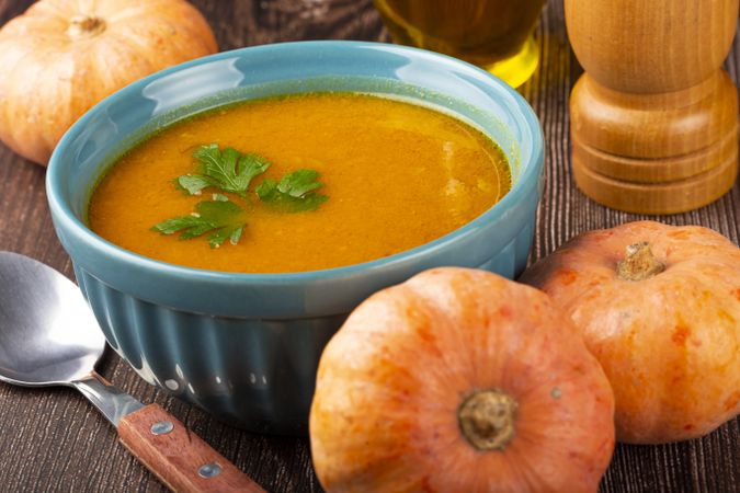 Delicious homemade pumpkin soup in bowl.