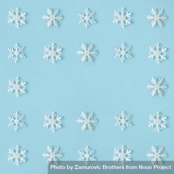 Snowflakes arranged on blue background bDo2Q4