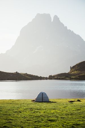 Majestic mountain landscape with tourist tent