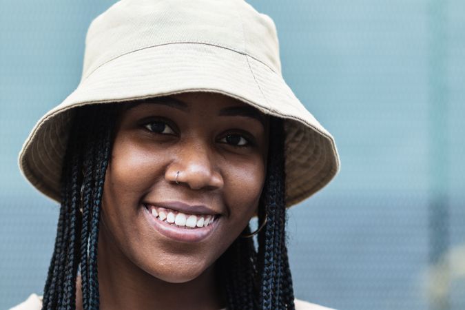 Young Black woman in hat