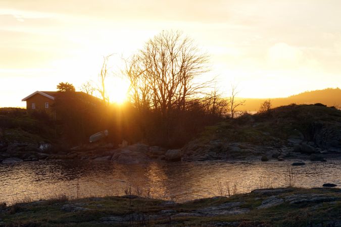 Peaceful seashore lake at sunset
