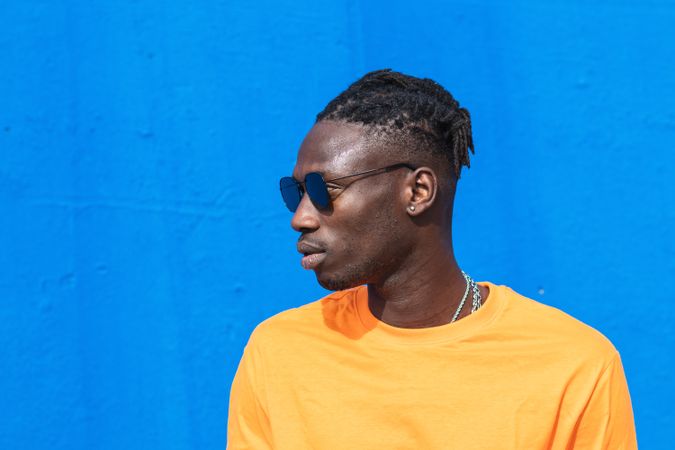 Modern hipster Black man in sunglasses