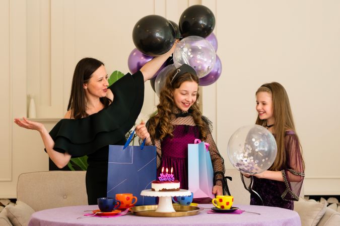 Family celebrates girl's birthday