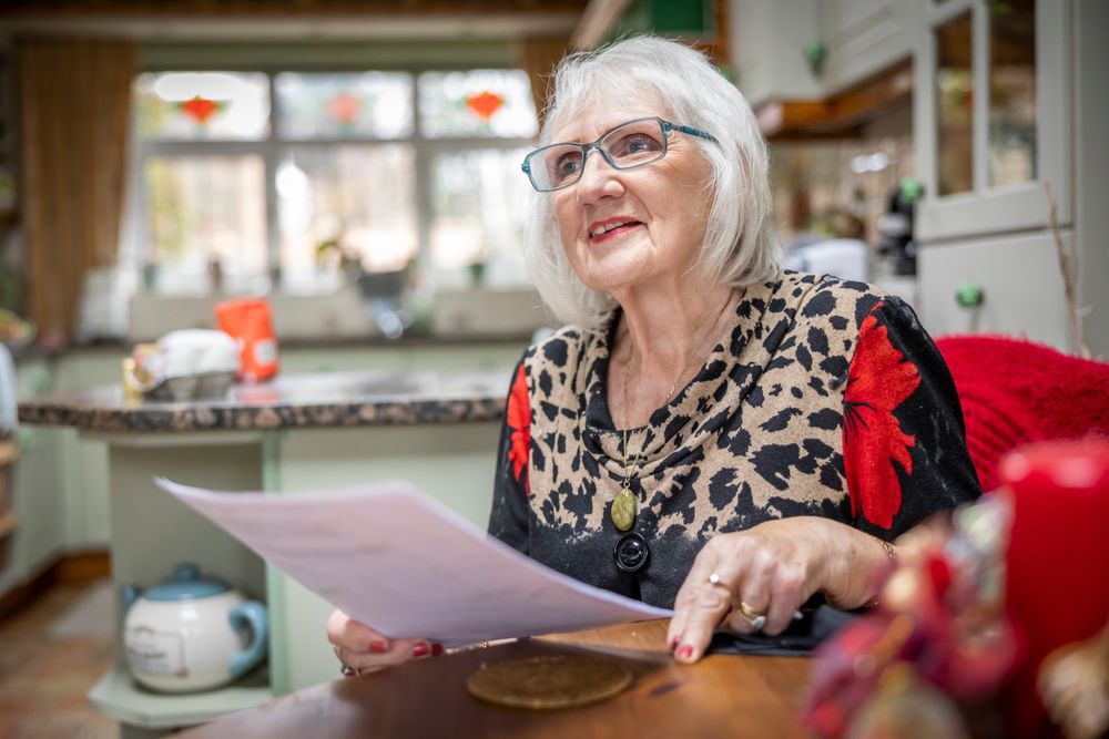Woman at kitchen table