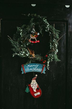 Christmas garland on a dark door