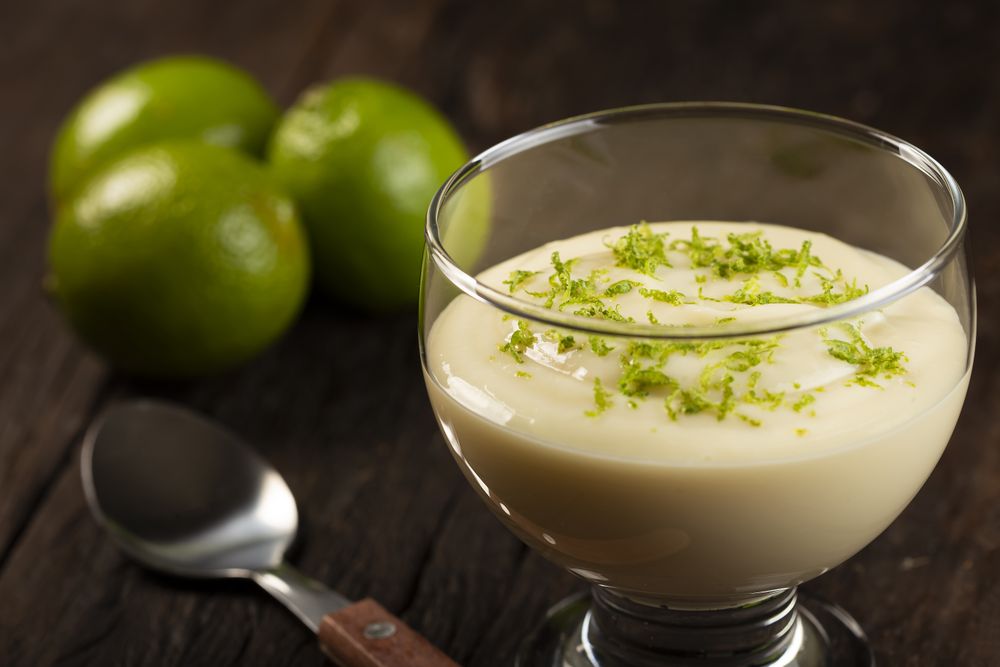 Lemon mousse with lemon zest on top.