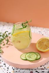 Infused iced water with lemon and cucumber garnish 4joErb