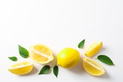 Flat lay composition with lemons on blank background, space for text