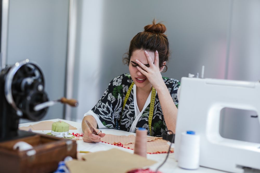 Woman in a sewing school