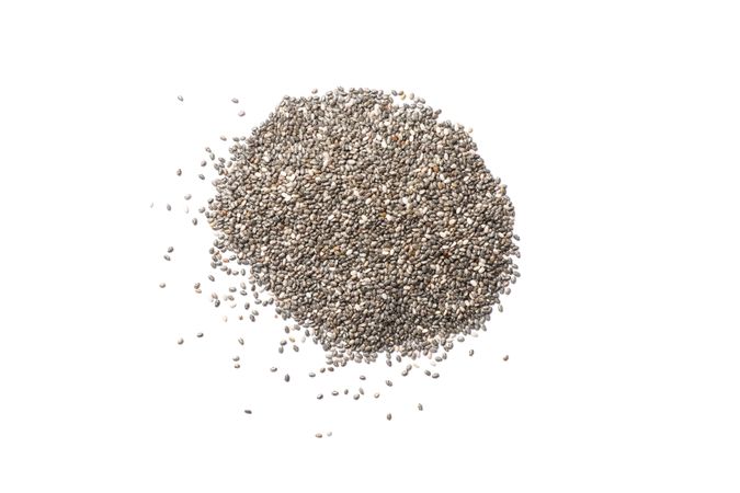 Heap of chia seeds isolated on blank background, top view