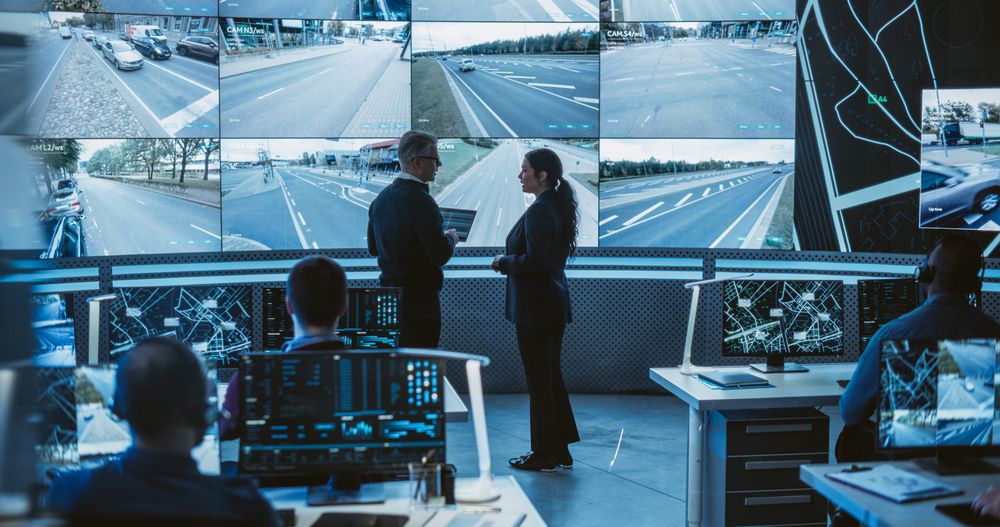 Team of Software Developers, Engineers and Data Scientists Working in a Modern Logistics Technology Company.