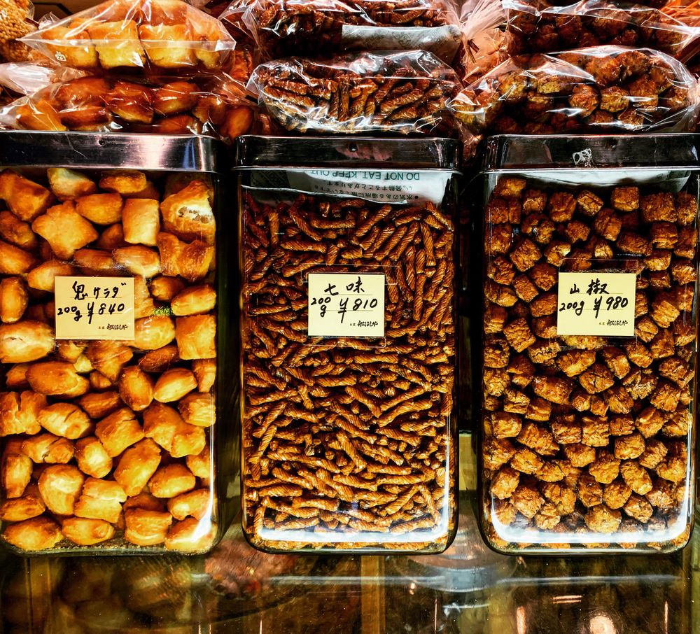 nuts and salty crackers in containers