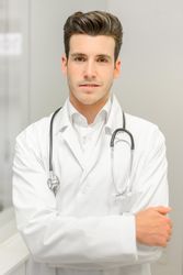 Young male doctor with stethoscope