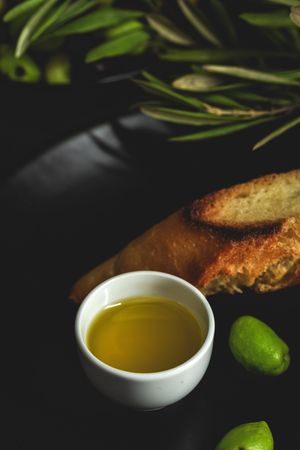 Fresh Spanish extra virgin olive oil with olives
