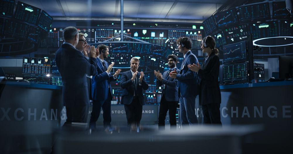 Diverse Specialists and Asset Managers Clapping, Cheering, Shaking Hands with the Team Leader