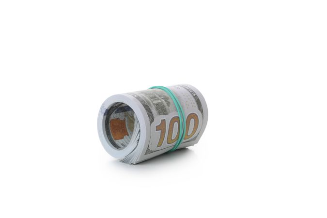 Dollar money isolated on light background, close up