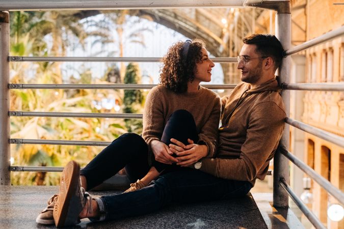 Happy couple hugging in pavilion