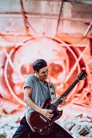 Musician playing electric guitar