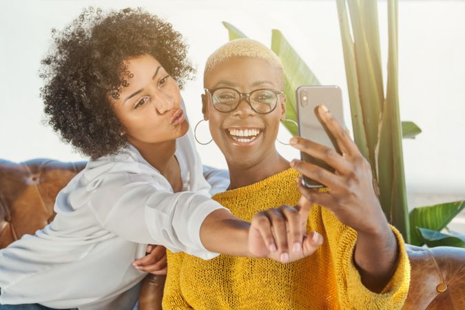 Diverse women having fun and taking selfie