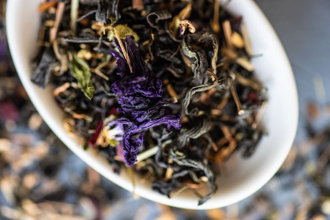 Top view of colorful loose leaf tea in a bowl