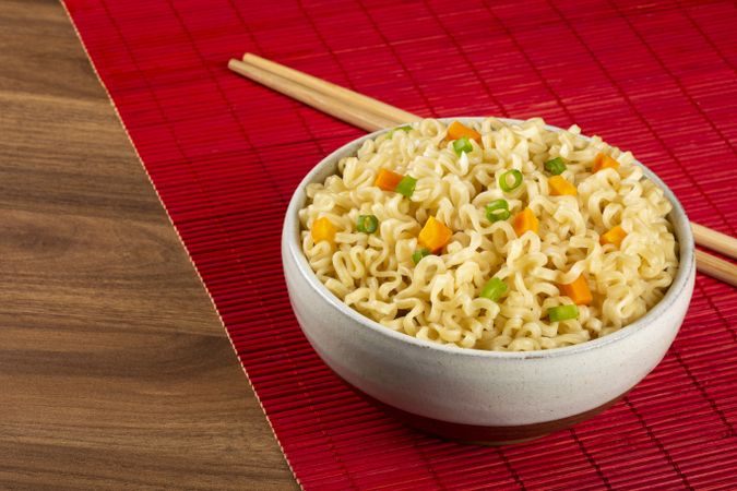Bowl with instant noodles on the table.