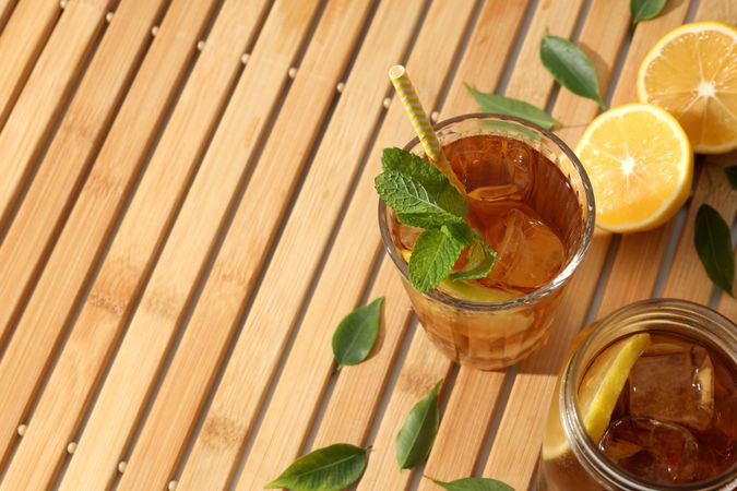 Cold tea with fresh oranges and mint leaves