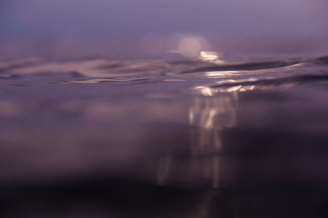 Water wave and cloudy sky