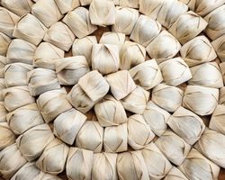 Wajit Cililin, sticky rice steamed in corn leaf, traditional Indonesian street food