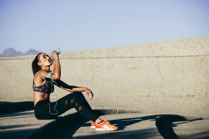 Fitness woman taking a break after workout