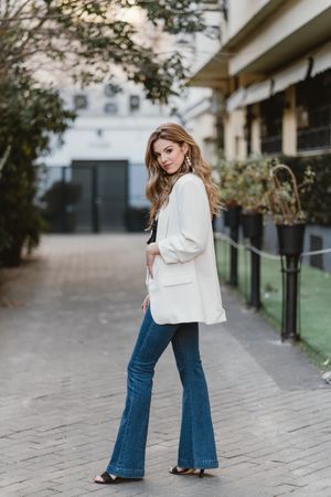 Charming woman posing on street