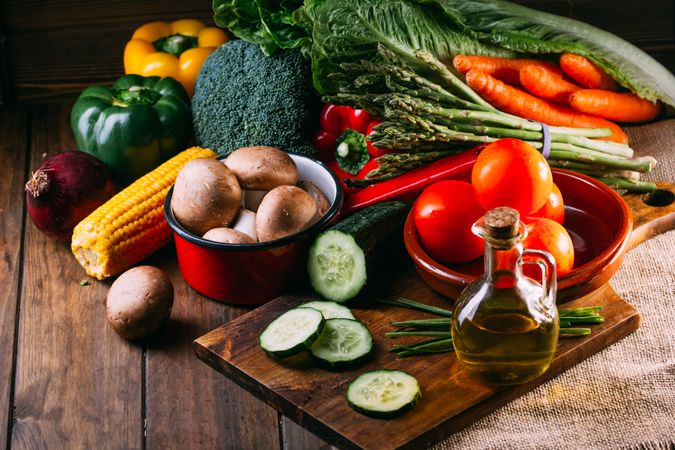 Vegetables and utensils on kitchen table